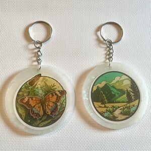 Hand Crafted Resin Butterfly and Mountain Scene Keychain Set of 2